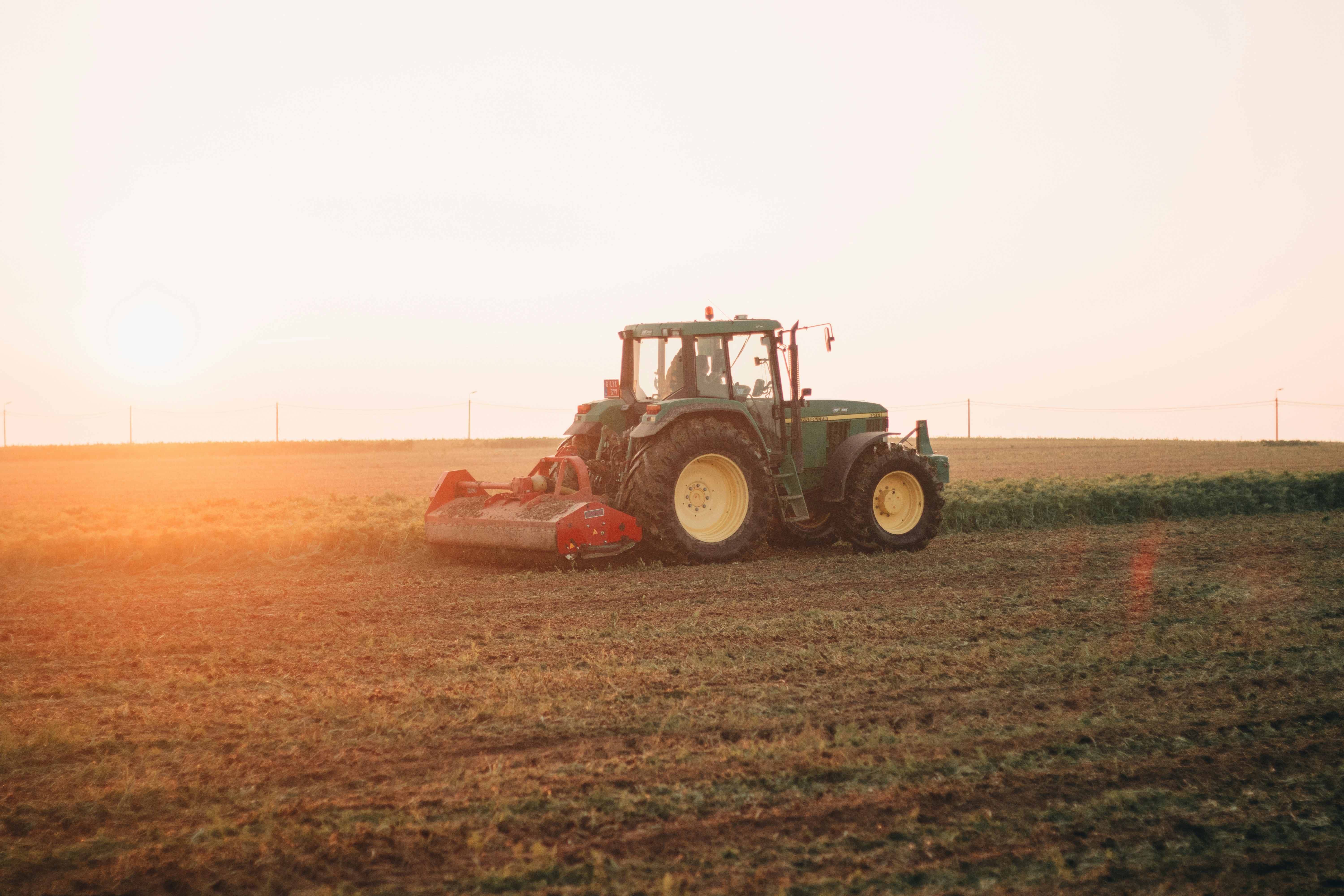 Rancher operating tractor safely